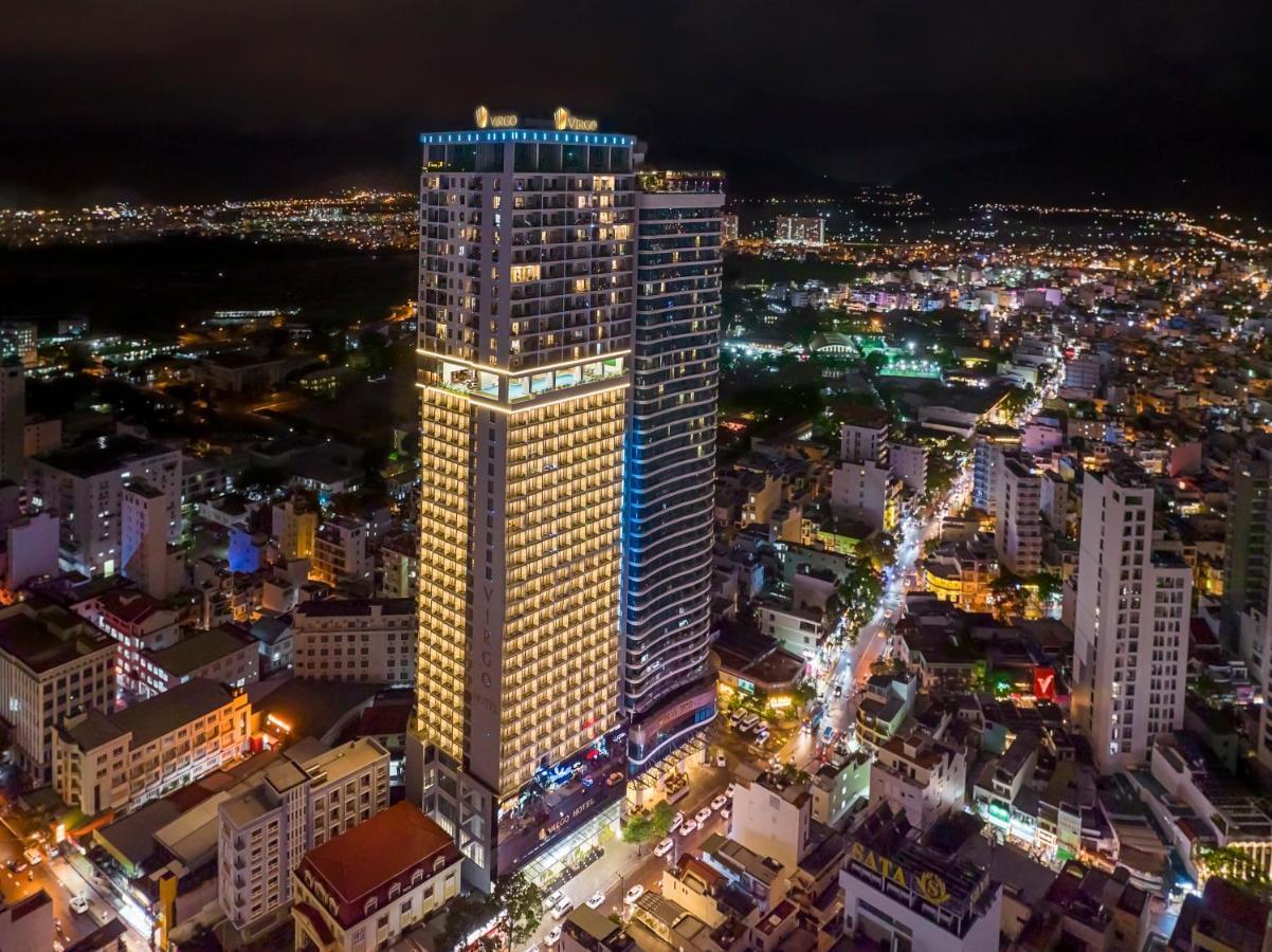 Virgo Hotel Nha Trang Buitenkant foto Aerial view of the hotel at night