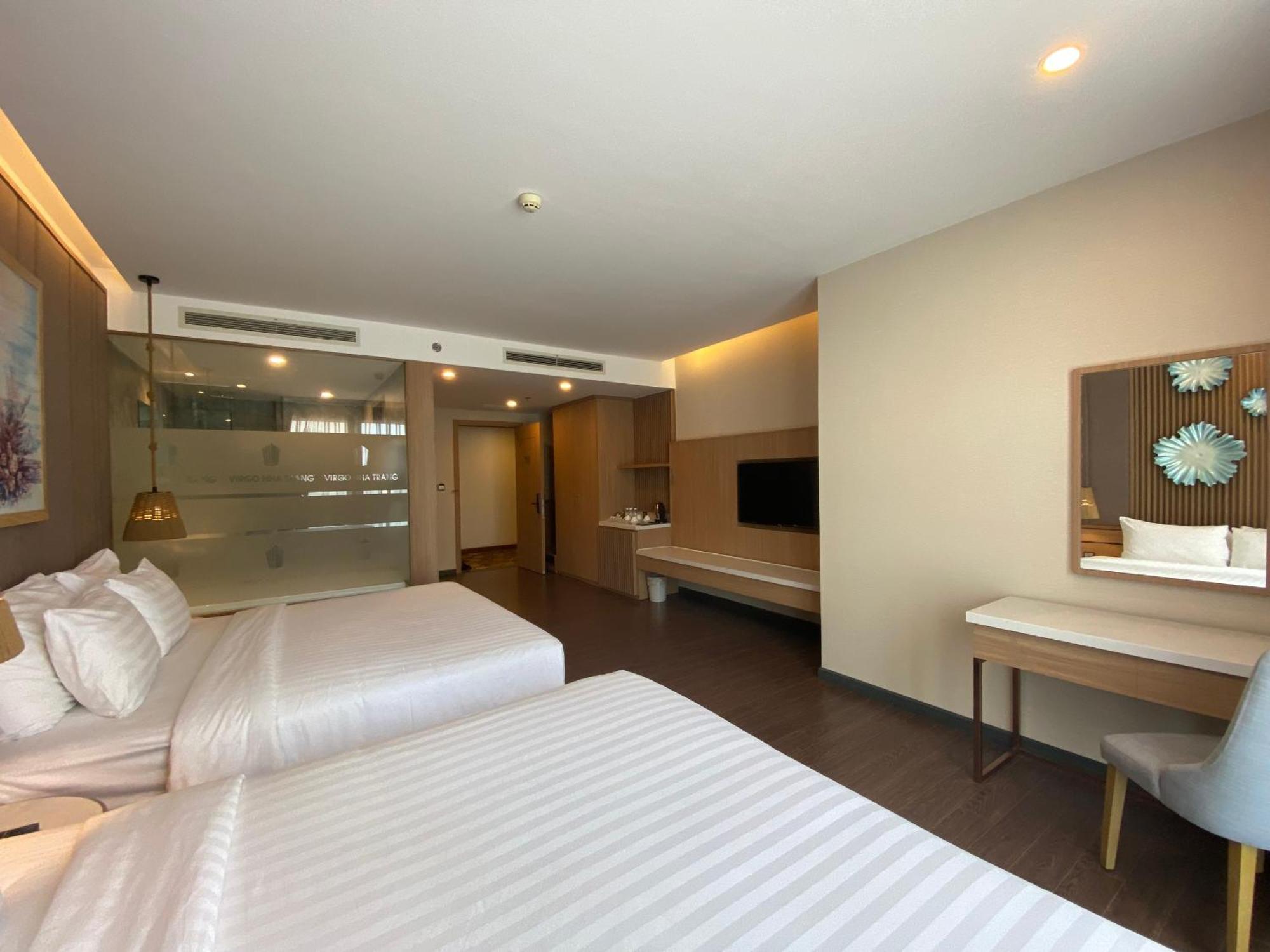 Virgo Hotel Nha Trang Buitenkant foto Deluxe Room